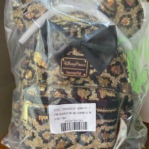 Disney parks cheetah print Loungefly